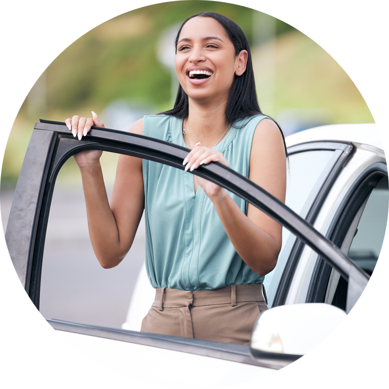 Lady smiling at car door