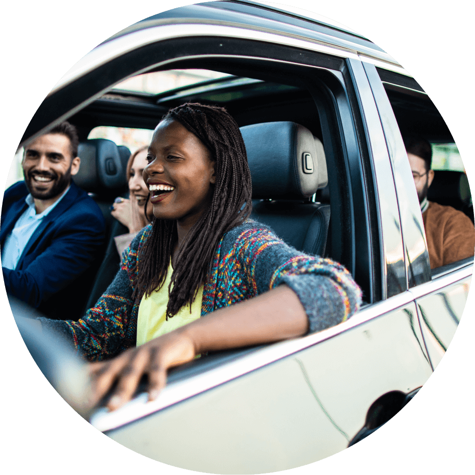 smiling people in car