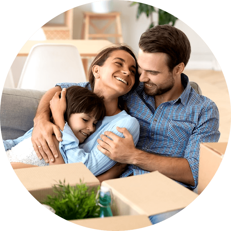 mom and dad with child on couch moving