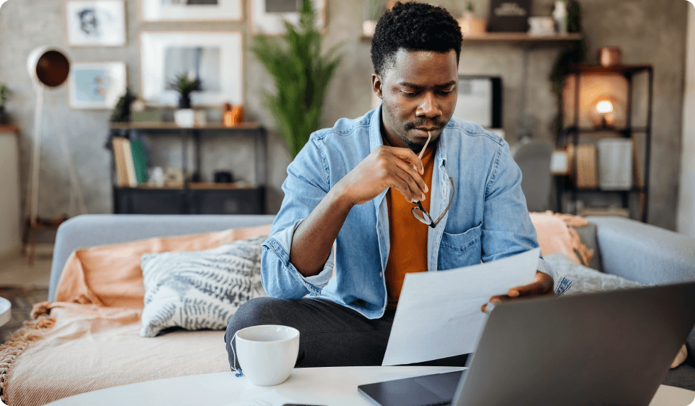 Man on couch with computer