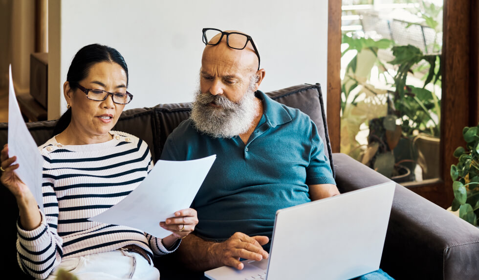 Couple looking through paperwork