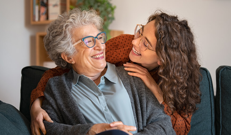 What is Power of Attorney? younger woman hugging an elderly woman