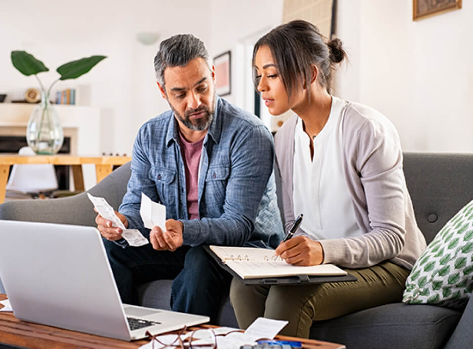 couple talking finances in home